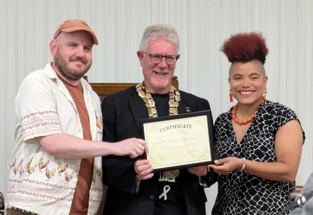 Happy Valley Pride and the new Mayor accepting the certificate for the Youth Section of the Service to the Community Award.