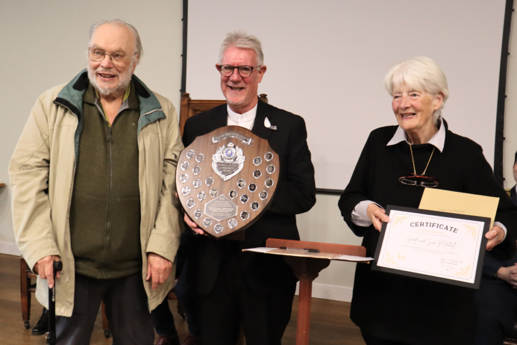 Geoff Mitchell (L) and Sue Mitchell (R) being presented with the Service to the Community Award by Cllr Keith Butterick (centre)